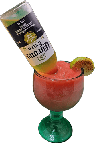 A refreshing margarita cocktail garnished with a lime slice on the rim of the glass.